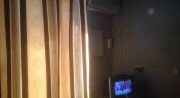 Фото номера Двухместный номер с 2 отдельными кроватями Гостиница na Primorskom г. Витязево 3