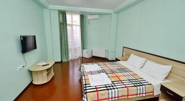 Фото номера Двухместный номер с 1 кроватью и балконом Гостиница Guest house Kaktus г. Витязево 8