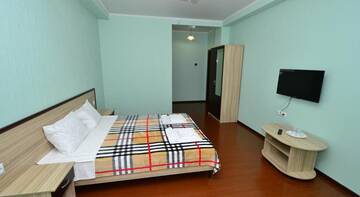 Фото номера Двухместный номер с 1 кроватью и балконом Гостиница Guest house Kaktus г. Витязево 6