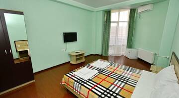 Фото номера Двухместный номер с 1 кроватью и балконом Гостиница Guest house Kaktus г. Витязево 7