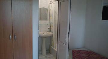 Фото номера Классический четырёхместный номер Гостиница Guest House Slava г. Витязево 4
