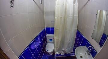Фото номера Двухместный номер с 1 кроватью или 2 отдельными кроватями, диваном и балконом Гостиница Moonlight г. Витязево 4