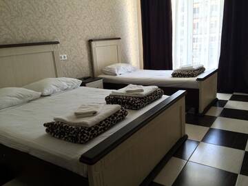 Фото номера Трехместный номер Гостиница Акрополь г. Витязево 4