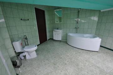 Фото номера Четырехместный номер с балконом Гостиница Мегаполис Гостевой дом г. Витязево 4